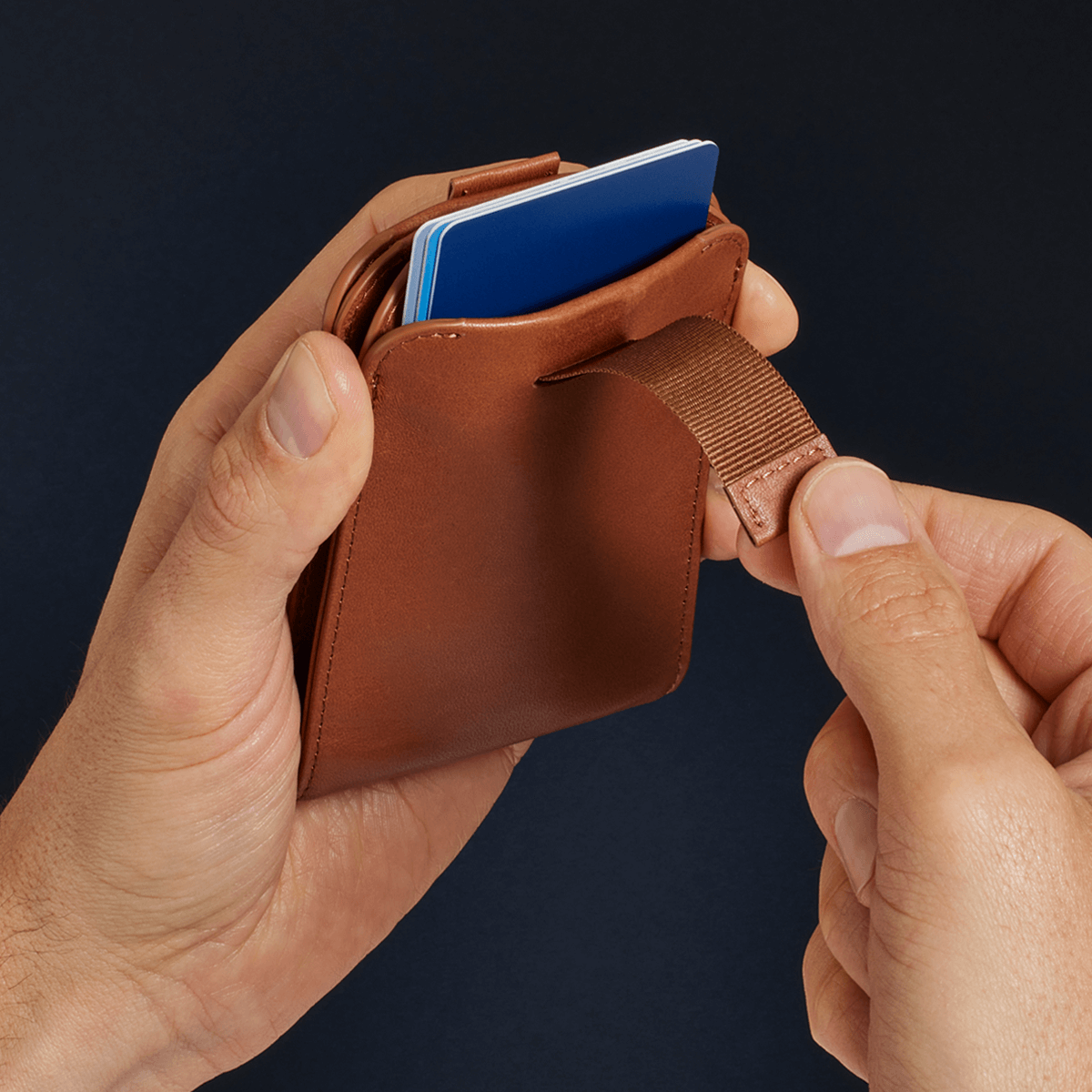 Distil Union Premium Wally Bifold 5.0 with Wally Pull-Tab card access, titanium money clip, RFID-shielding and ID window in rich brown leather