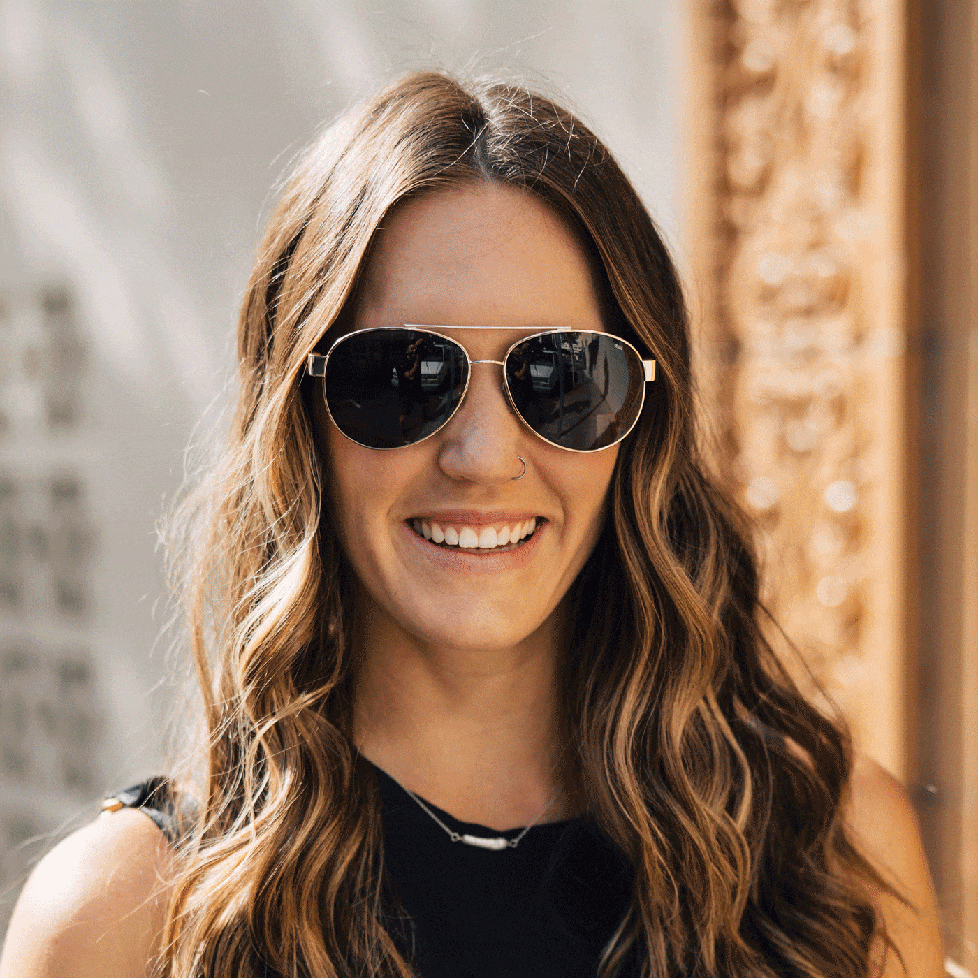 Portraits of Distil Union Titanium Maverick MagLock Sunglasses in silver or gold, with flex-to-fit arms and polarized lenses