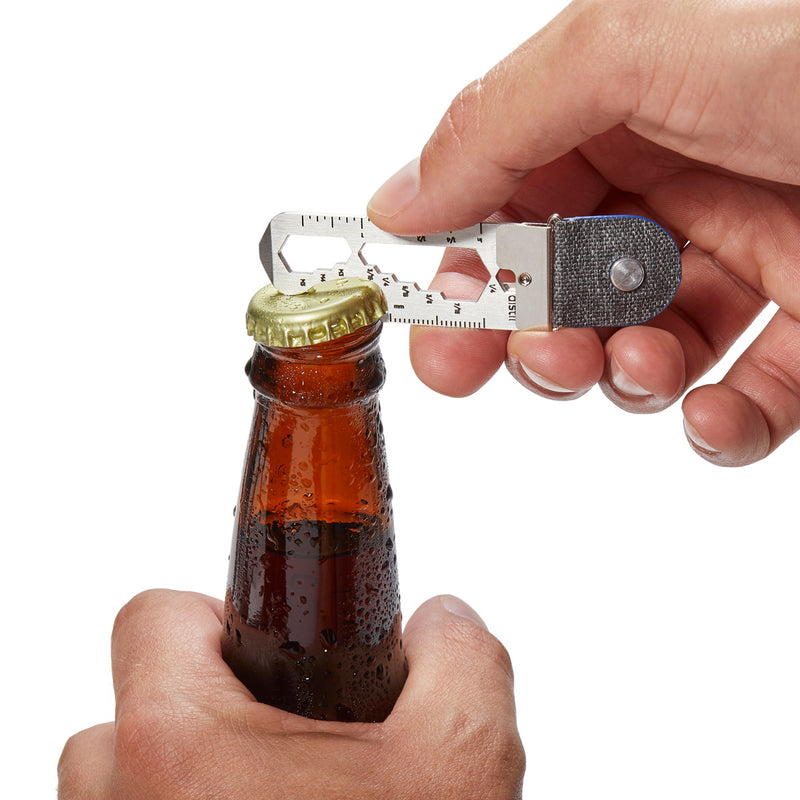 distil keymod multitool being used to open a beer bottle