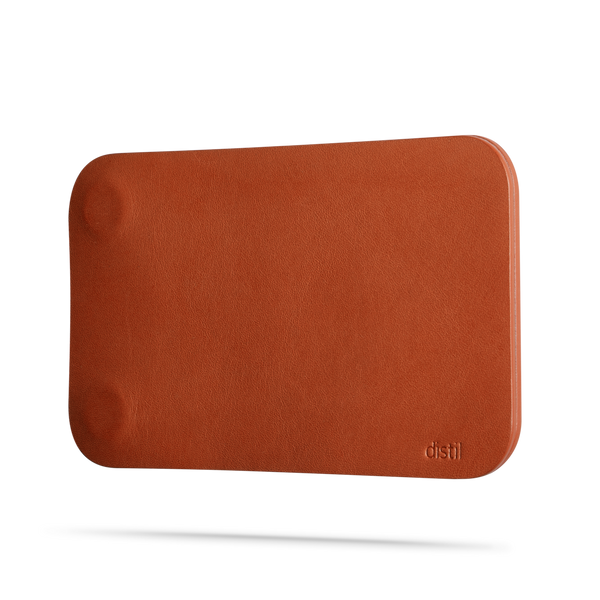 angle view of brown leather modwallet cover with small distil logo on bottom right corner