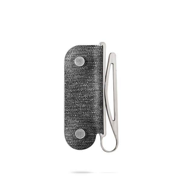 distil moneyclip made of cnc coated steel on a white backdrop