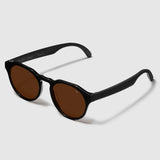 angle view of distil cooper sunglasses with black frames and amber polarized lens