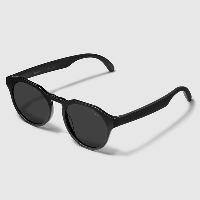 angle view of distil cooper sunglasses with matte black frames and polarized lens