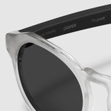 close up view of distil cooper sunglasses with matte crystal frames and polarized lens