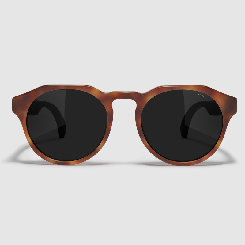 front view of distil cooper sunglasses with matte tortoise frames and polarized lens