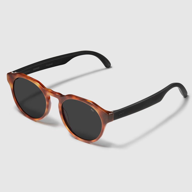 angle view of distil cooper sunglasses with matte tortoise frames and polarized lens
