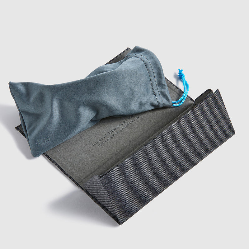 Included soft sleeve doubles as a lens cloth, shown with gray fabric folding case