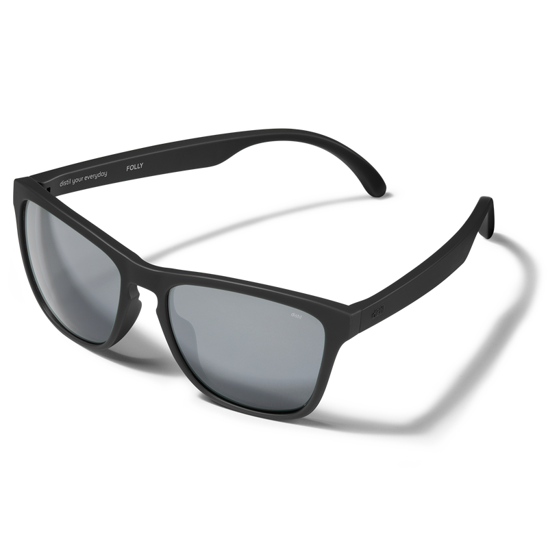 Distil Union Folly MagLock sunglasses in a black wayfarer design and polarized lens on a white backdrop