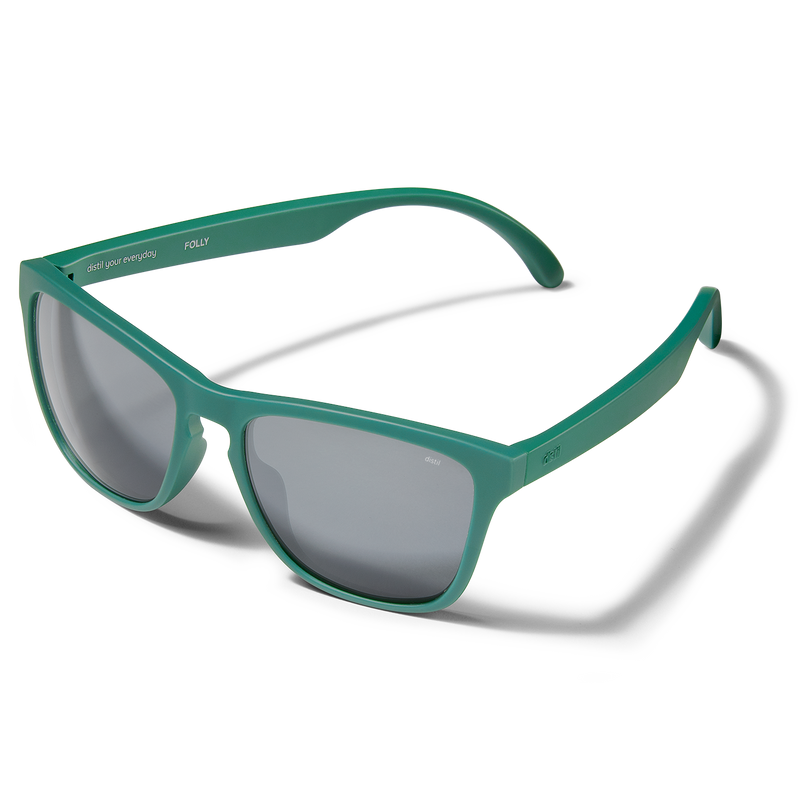 Distil Union Folly MagLock sunglasses in a turquoise wayfarer design and polarized lens on a white backdrop